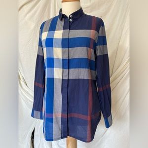 Burberry Brit, asymmetrical plaid print in blues and purples, fit woman’s size S